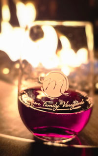 Glass of wine by the fire